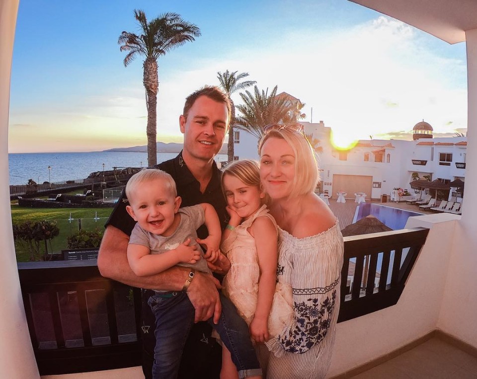 Karen with husband Shaun, baby Quinn and daughter Esme on a beach resort holiday in Spain in January