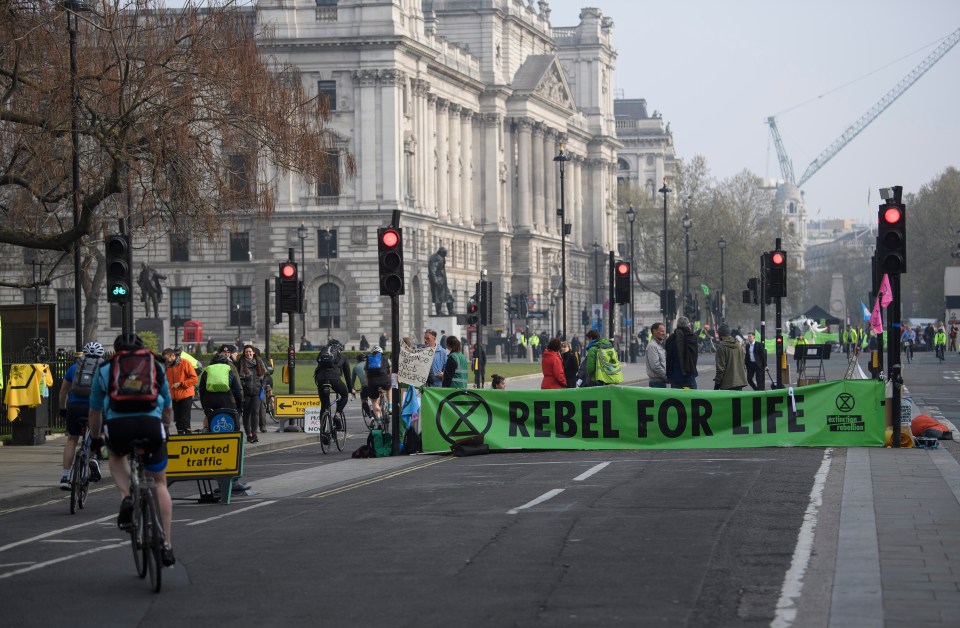  Roads empty of cars as Extinction Rebellion climate change protesters occupy Parliament Square in London on a fourth day of protests