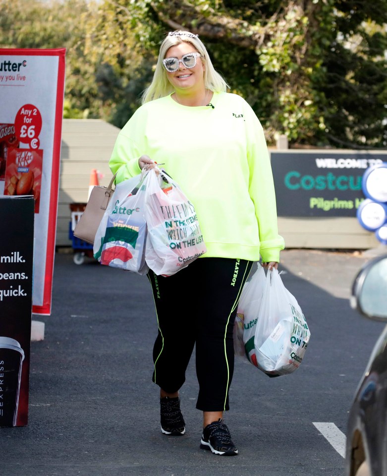  Gemma emerged from the shop with four bags of chocolate treats