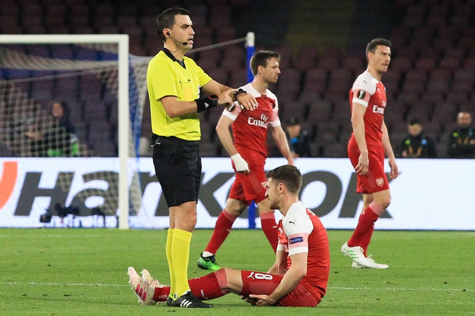  Aaron Ramsey went off with a hamstring injury that could spell the end of his Arsenal career