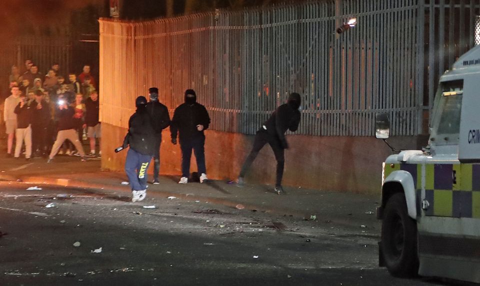  Masked men launched petrol bombs, bottles and missiles at police during rioting in Londonderry last night