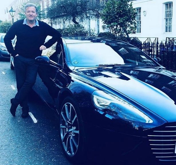  Piers shows off his new Aston Martin outside his city townhouse