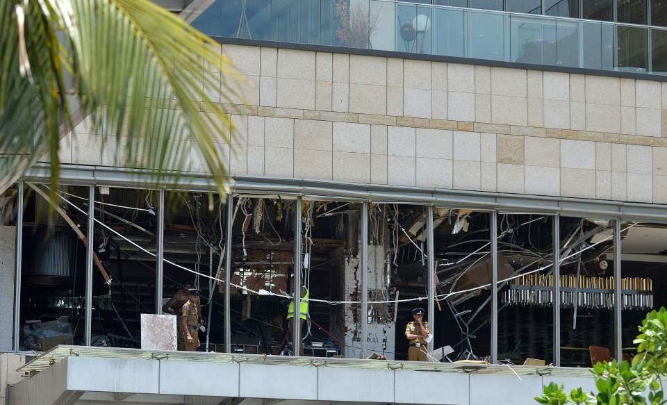  Wires hang from the roof of the luxury hotel Shangri-La after the bomb attack