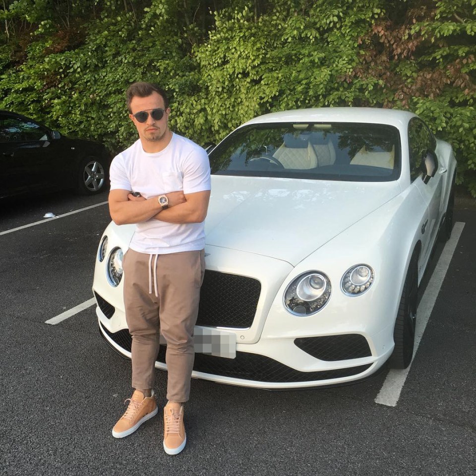  Shaqiri poses alongside his white Bentley Continental