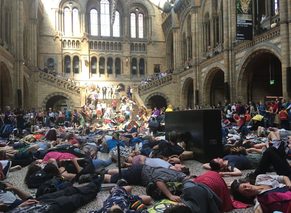  Baffled families picked their way round the edge of the collapsed group