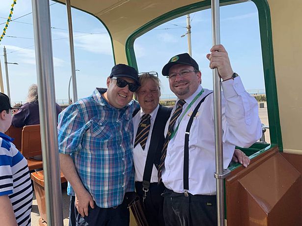  Peter posed with a tram driver and conductor in Blackpool