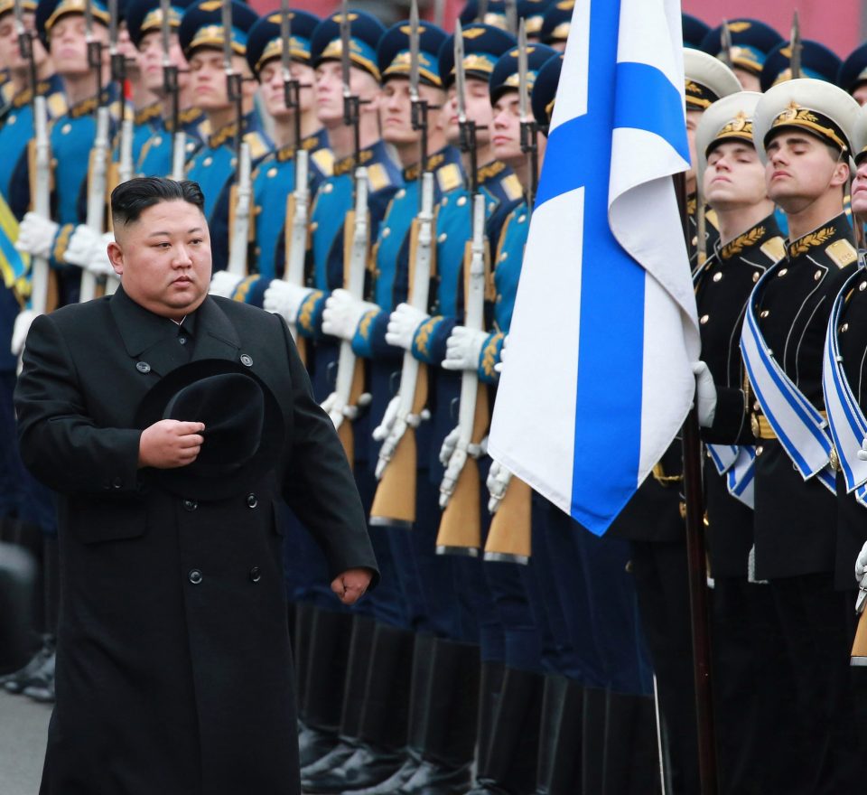  Kim Jong-un inspects a Russian guard of honour after his arrival in Vladivostok yesterday