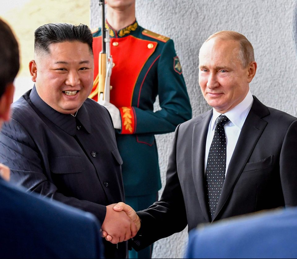  Kim and Putin smiled as they shook hands - they are expected to discuss efforts to denuclearise North Korea