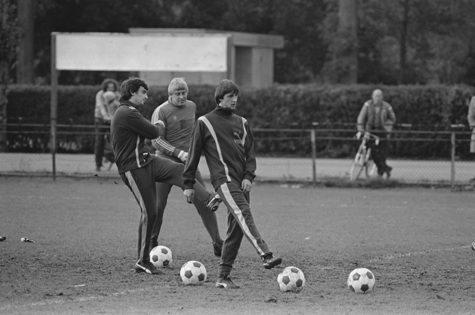  The late great Johan Cruyff, right, trains with Clarke, left and Dutch international keeper Piet Schrijvers