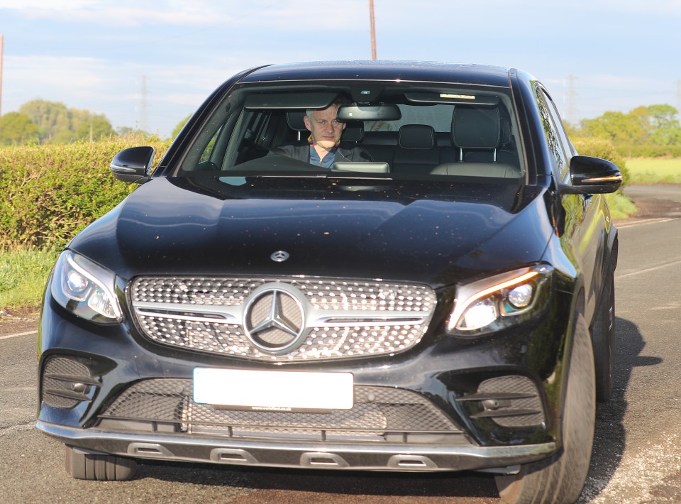  Ole Gunnar Solskjaer drives in for training at Carrington on Friday morning