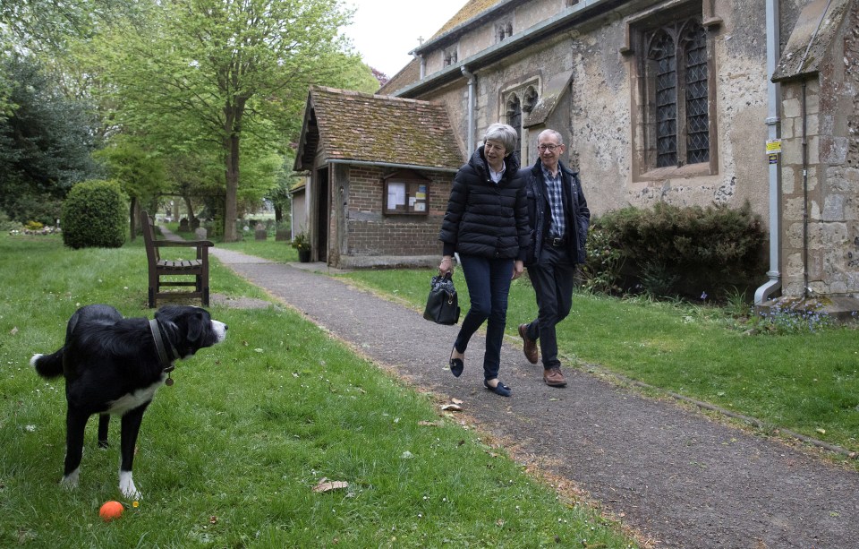  The PM with husband Philip outside church today