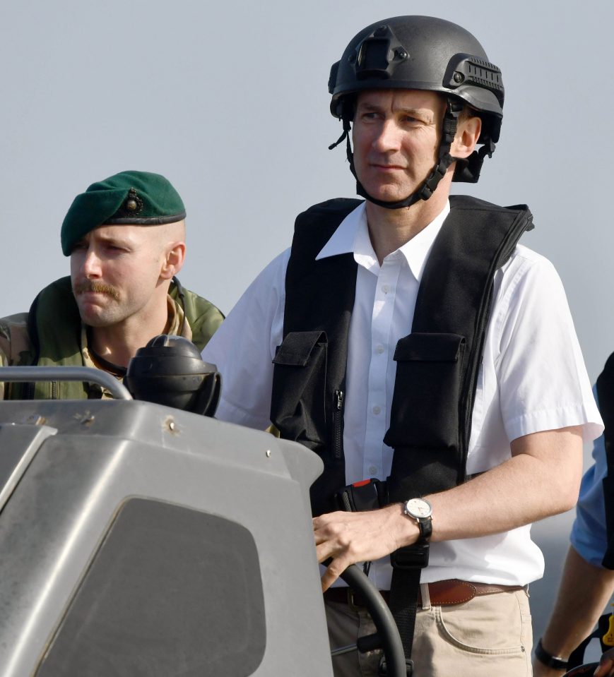  Jeremy worse a helmet aboard the ship where he viewed a Marine Security demonstration at a Harbour in Dakar, Senegal