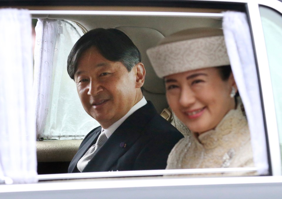 Japan’s Crown Prince Naruhito and Crown Princess Masako arrive at Imperial Palace