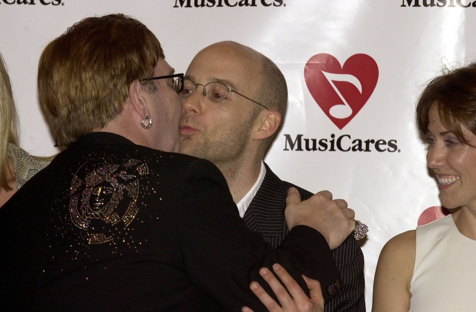  Sir Elton John greets Moby with a kiss in 2000