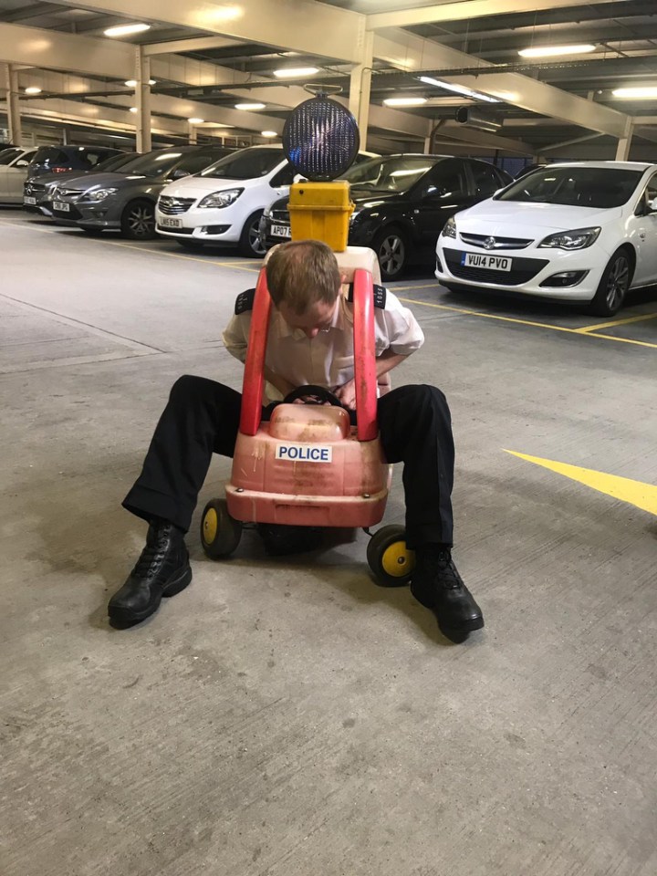 Police uploaded a snap of a traffic cop stuck in a kids' toy car to Twitter