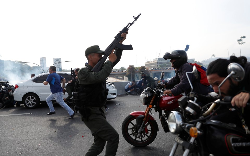  Soldiers and people react to the sound of the gunfire