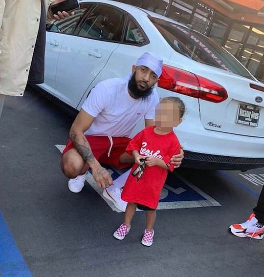  Nipsey Hussle was pictured with fans on Sunday just hours before he was shot dead