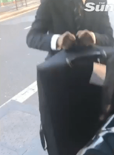  A hotel concierge team help load Gemma's cab with all her cases