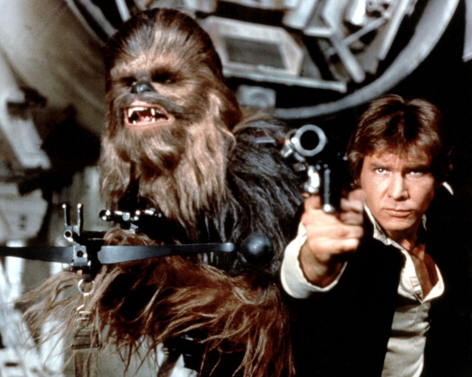  Peter Mayhew as Chewbacca and Harrison Ford as Han Solo in 1977. Ford described Mayhew as a 'kind and gentle man' who he loved