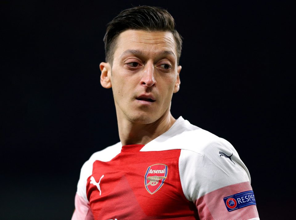  Mesut Ozil insists he is not quitting Arsenal this summer