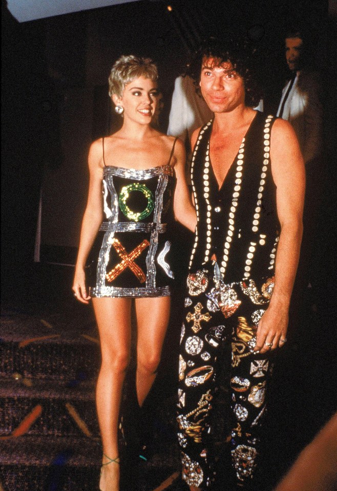  1990 saw Kylie shake off her  girl-next-door image and transform into a sex kitten with cropped hair and skimpy noughts and crosses dress.