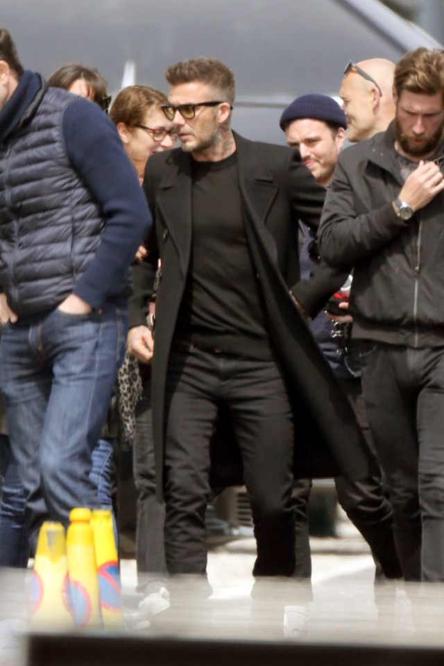 David put on a pair of cool shades as he walked around on set