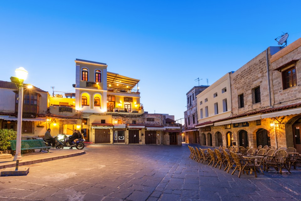  Relax on Hippocrates Square in downtown Rhodes