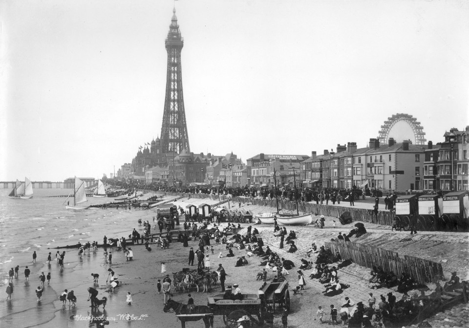  The crowds at Blackpool beach, with the famous tower in the background, taken in 1920