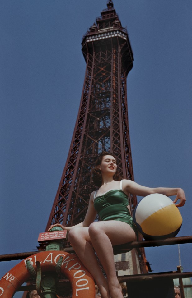  A young woman with a beach ball in front of Blackpool Tower on 23rd June 1955