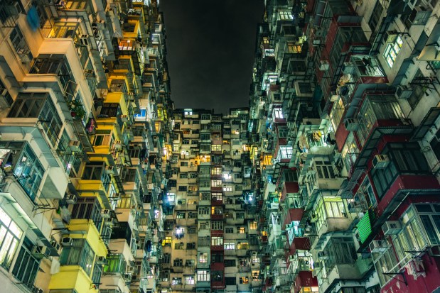 Buildings crowd on top of each other in this claustrophobic shot, taken in Hong Kong