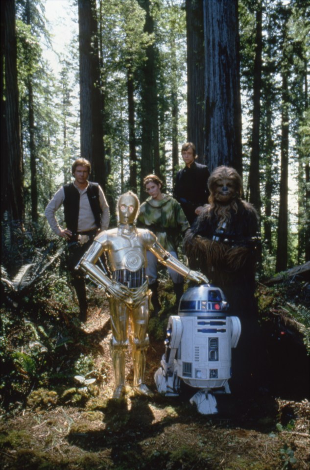  American actors Harrison Ford. Carrie Fisher and Mark Hamill with Brits Anthony Daniels and Peter Mayhew on the set of Star Wars: Episode VI - Return of the Jedi