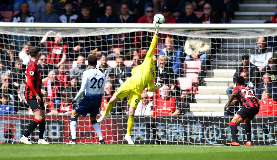  Debut-making goalkeeper Mark Travers pulled off a string of first-half saves to keep Tottenham out