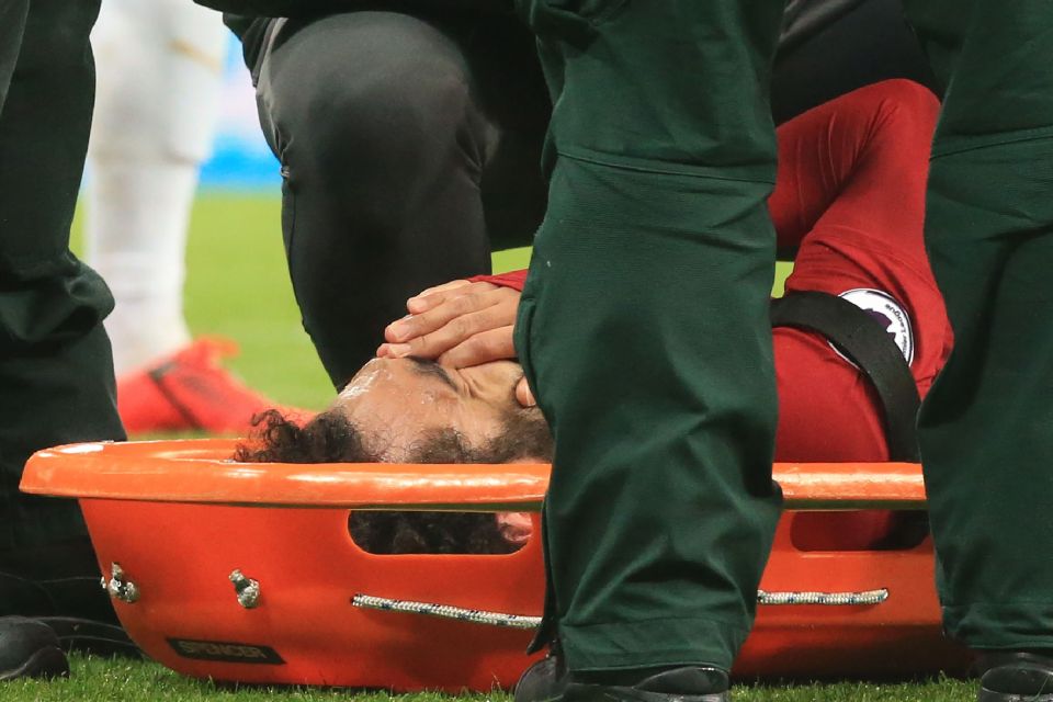  Mo Salah stretchered off after clash with Martin Dubravka