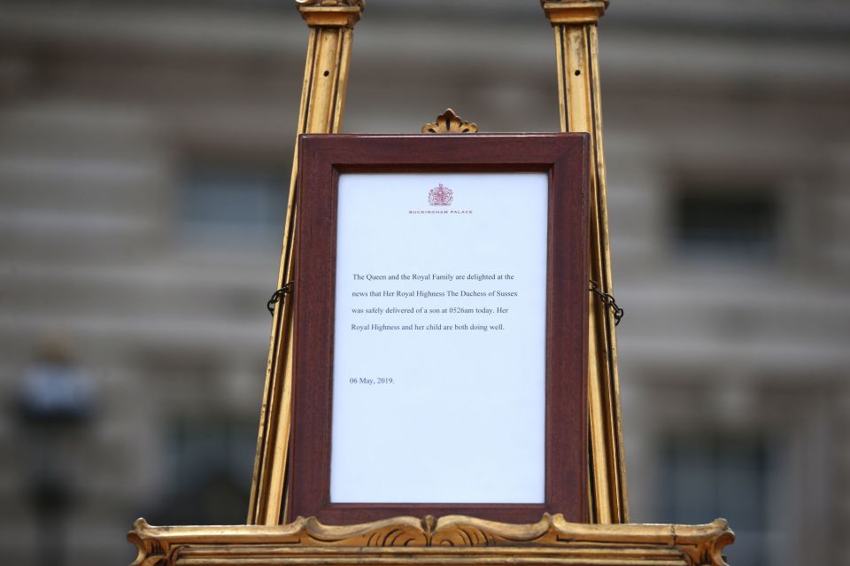  A framed notice of birth has gone on display on a ceremonial easel on the forecourt of Buckingham Palace