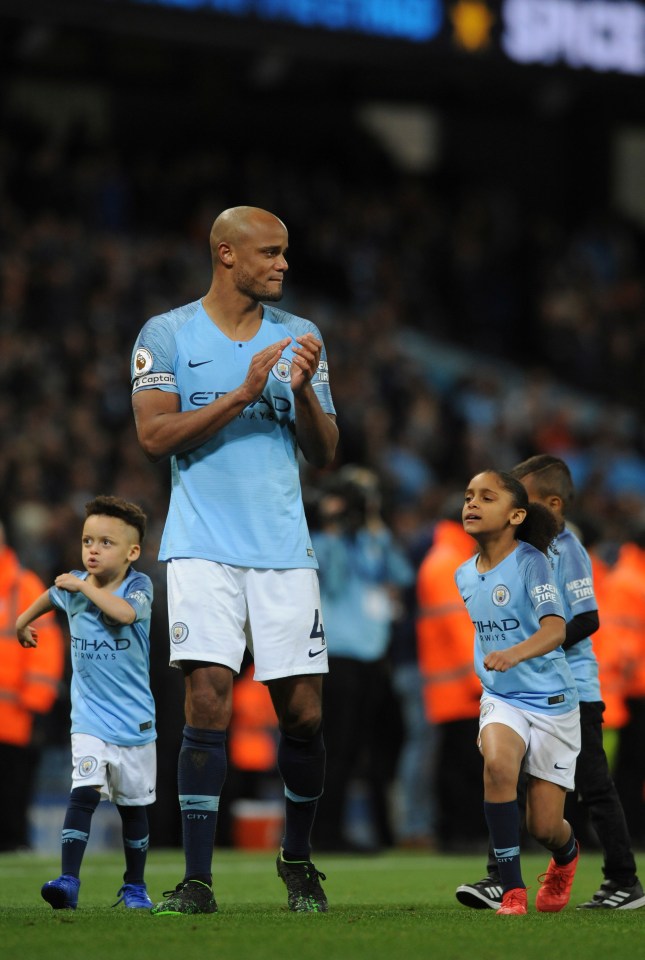  Kompany with his kids at the Etihad