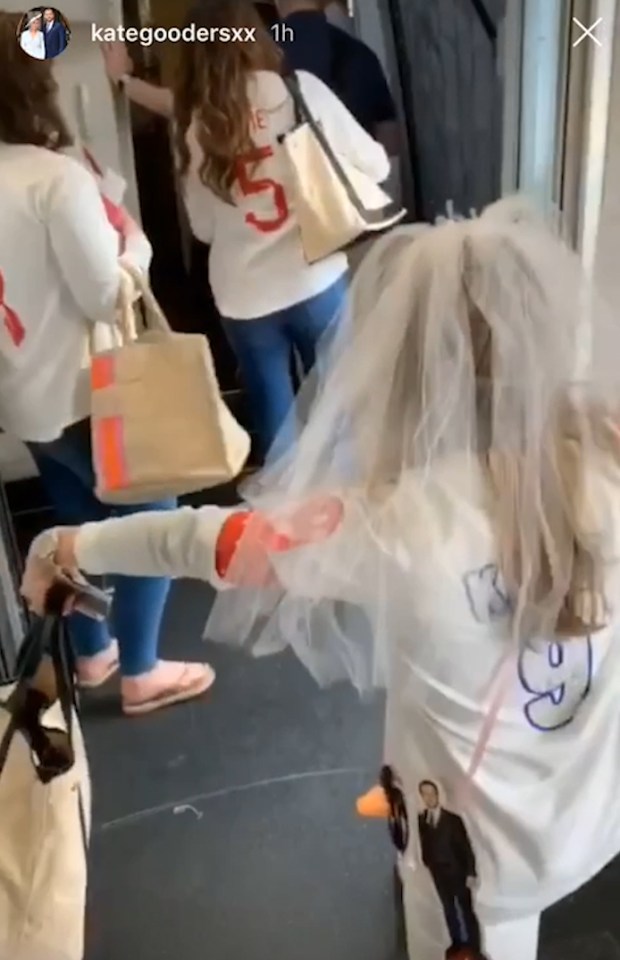  Goodland and her seven pals donned Three Lions training tops at Heathrow airport