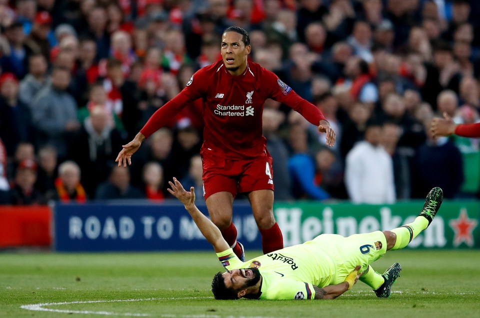  Reds' old boy Luis Suarez spent plenty of time on the turf while trying to con the referee on his return to Anfield