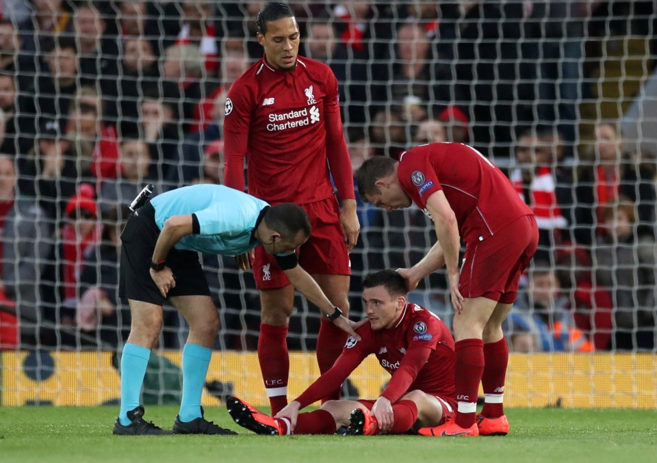  Andy Robertson was forced off after appearing to be kicked by Luis Suarez