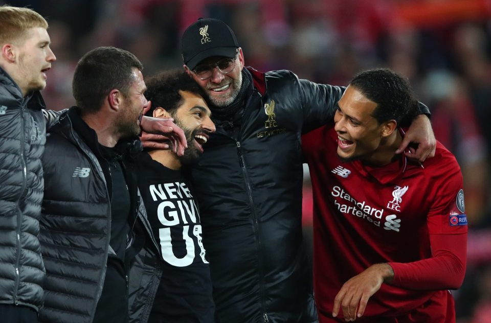  Jurgen Klopp hugged Reds heroes Mo Salah and Virgil van Dijk at full-time