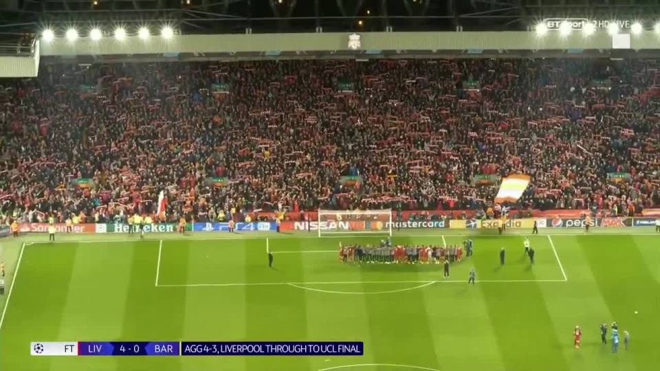  As the players joined with the crowd celebrating a momentous victory, Jordan Henderson, pictured bottom right here, was being interviewed