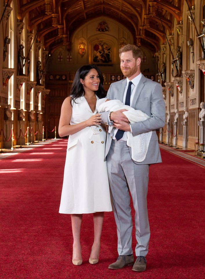  Meghan Markle stepped out in a Grace Wales Bonner trench dress as she and Prince Harry posed for photos with their newborn