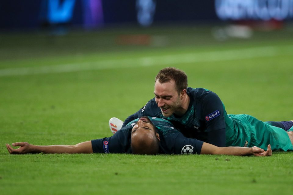  Christian Eriksen embraces Moura after his incredible winner in the Johan Cruyff Arena