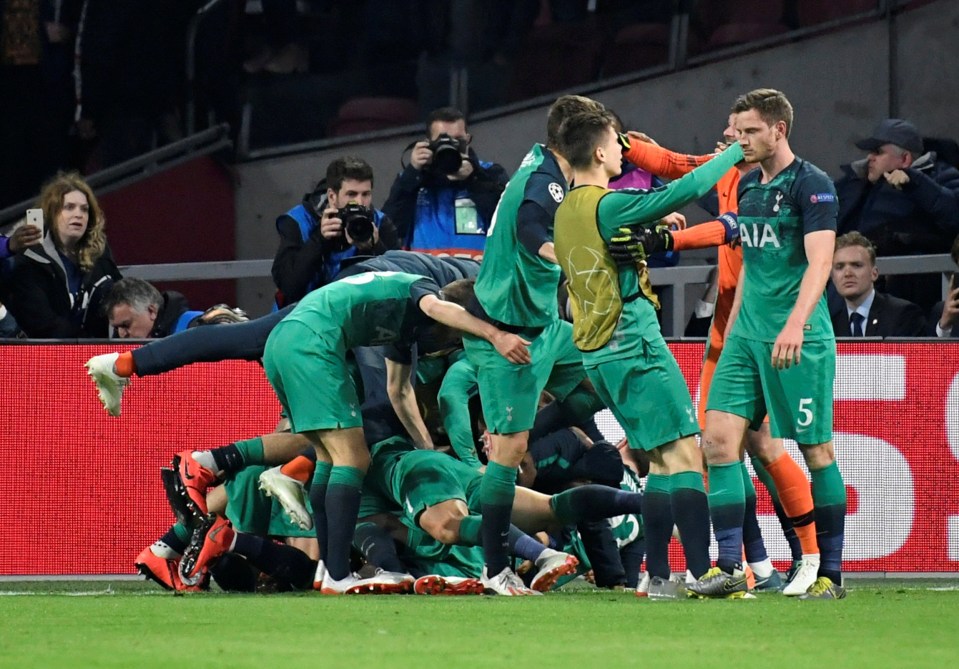  Three-goal hero Moura was mobbed by team-mates after his winner