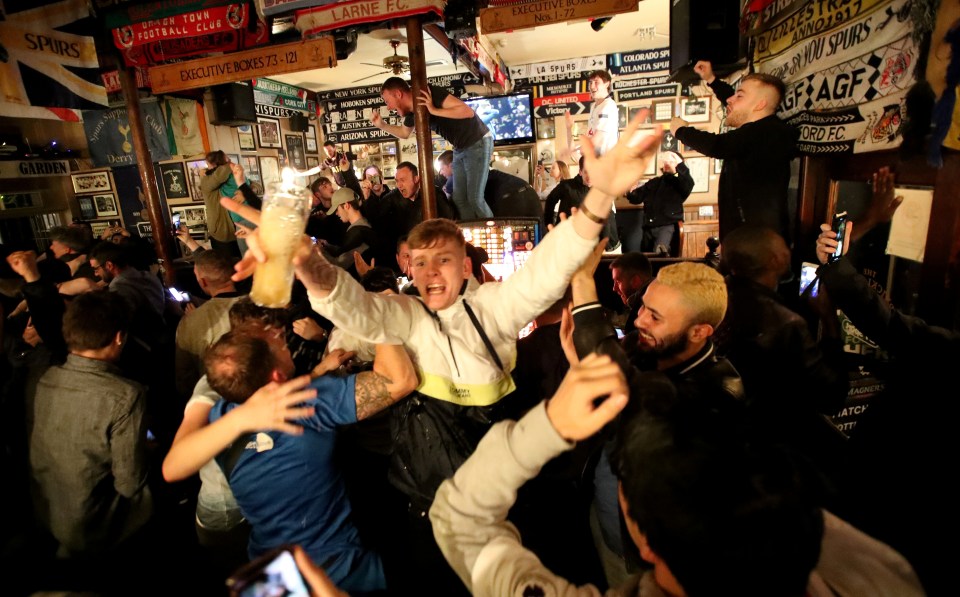  Spurs fans go wild in The Bricklayers pub in Tottenham