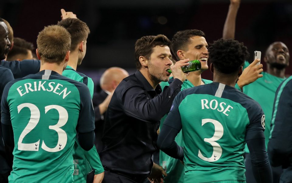  Mauricio Pochettino celebrated by taking a swig of beer on the pitch