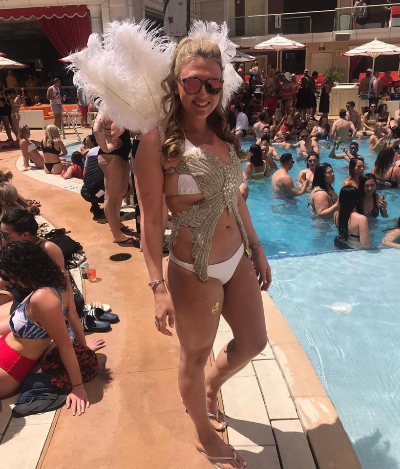  Katie Goodland stood out from the crowd in a feather-laden bikini