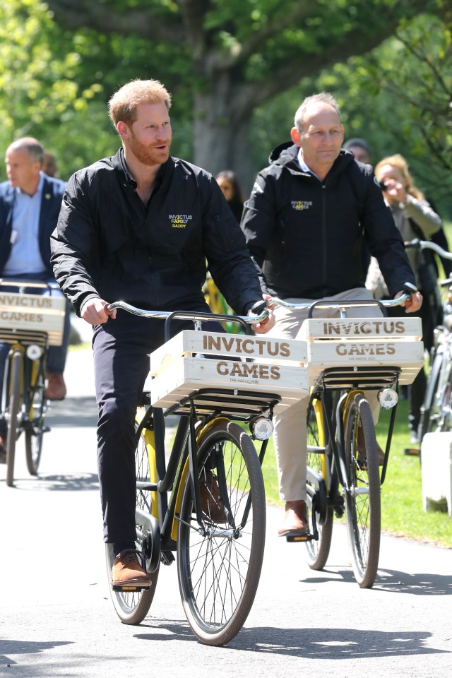  Prince Harry then rode a bike for the tour around the Sportcampus Zuiderpark