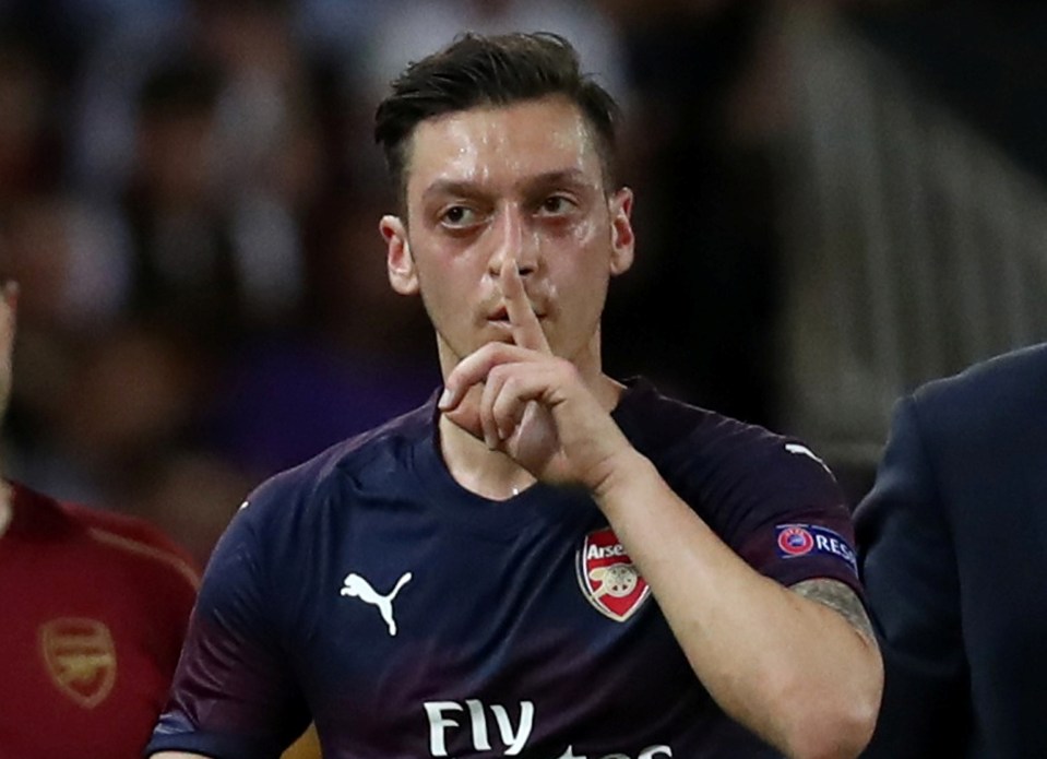  Arsenal ace Mesut Ozil shushed the Valencia fans after being substituted in the second half