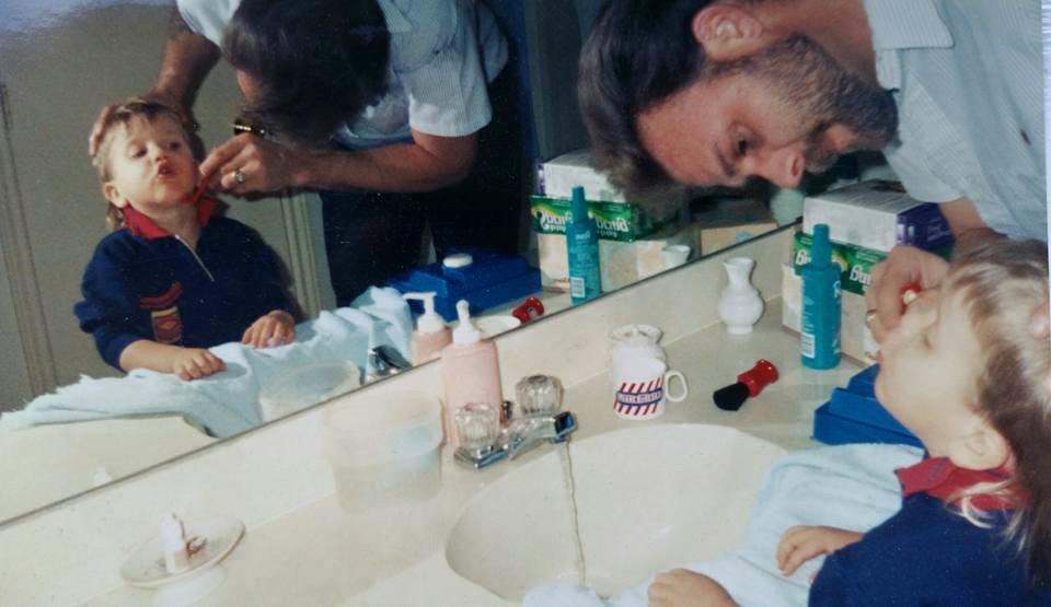 Ken Hermes with his dad Kenneth pretending to shave his face when he was a little boy – before he took his own life