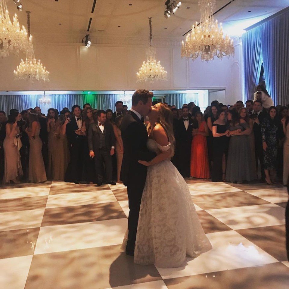  Hollywood producer Trevor Engelson, 42, kissing new bride Tracey Kurland, 31, at their Californian wedding on Saturday